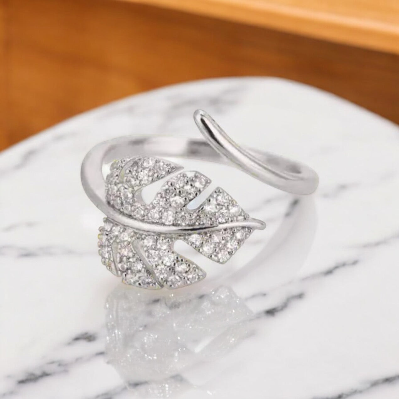 Elegant Gold Leaf Ring with Sparkling Crystals