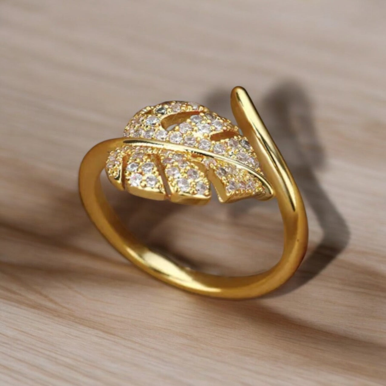 Elegant Gold Leaf Ring with Sparkling Crystals