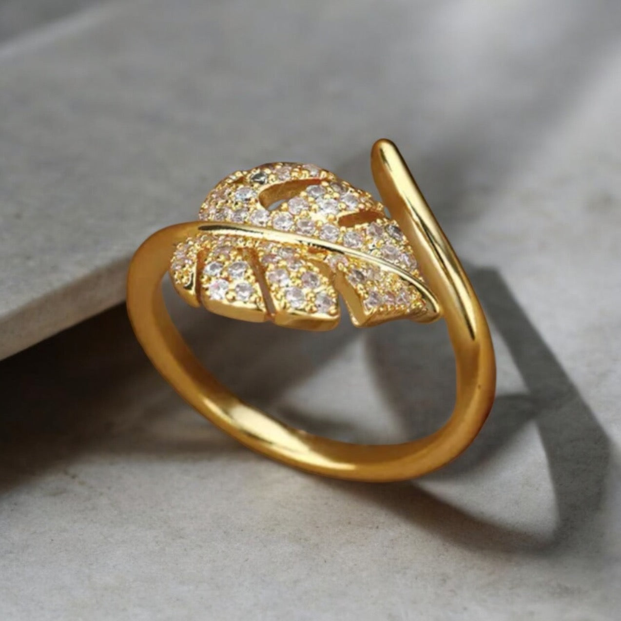 Elegant Gold Leaf Ring with Sparkling Crystals